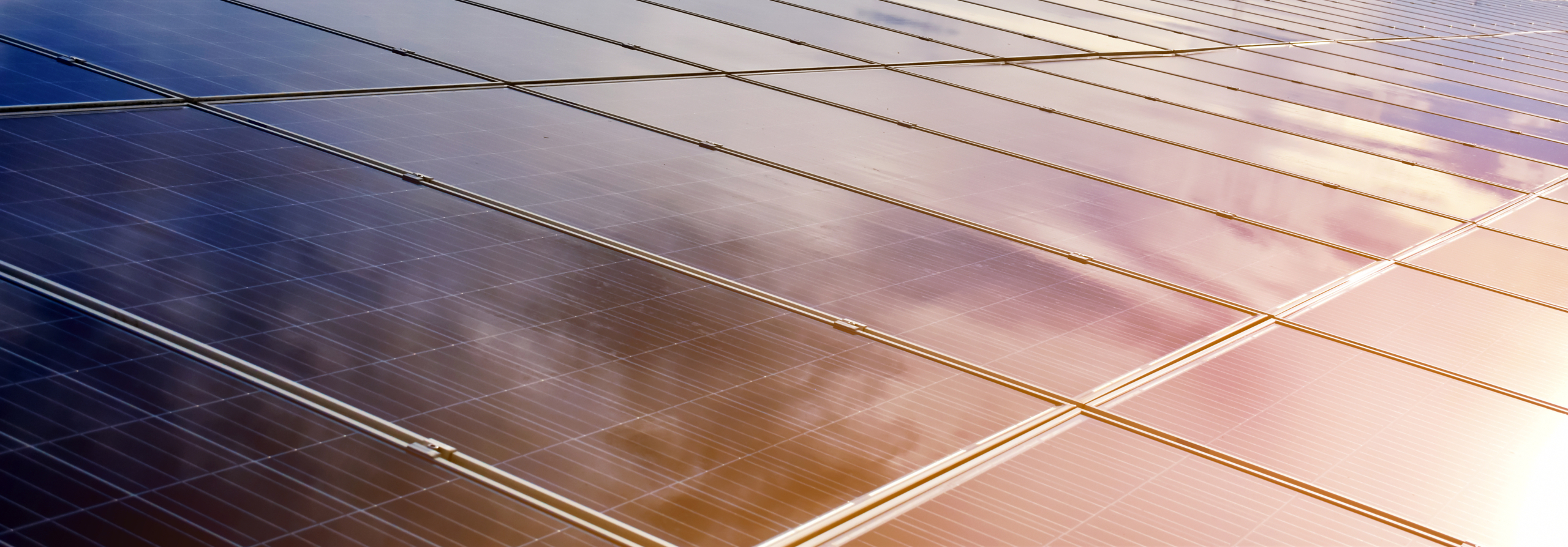 Closeup photovoltaic panel rooftop with reflection of the sunlig